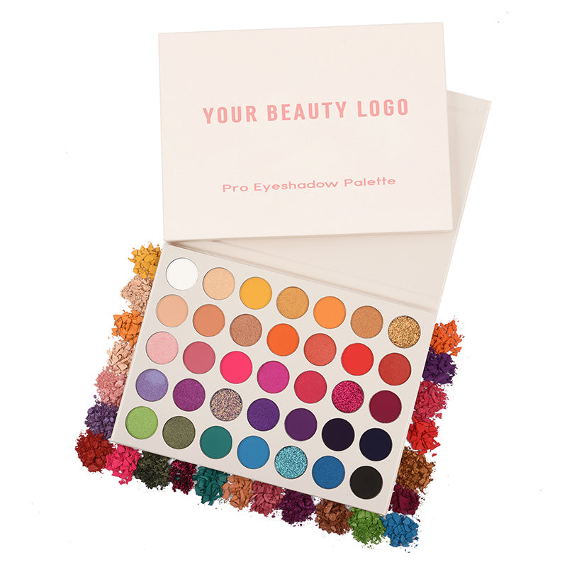 Eyeshadow palette with colorful shades and a branded box on a white background